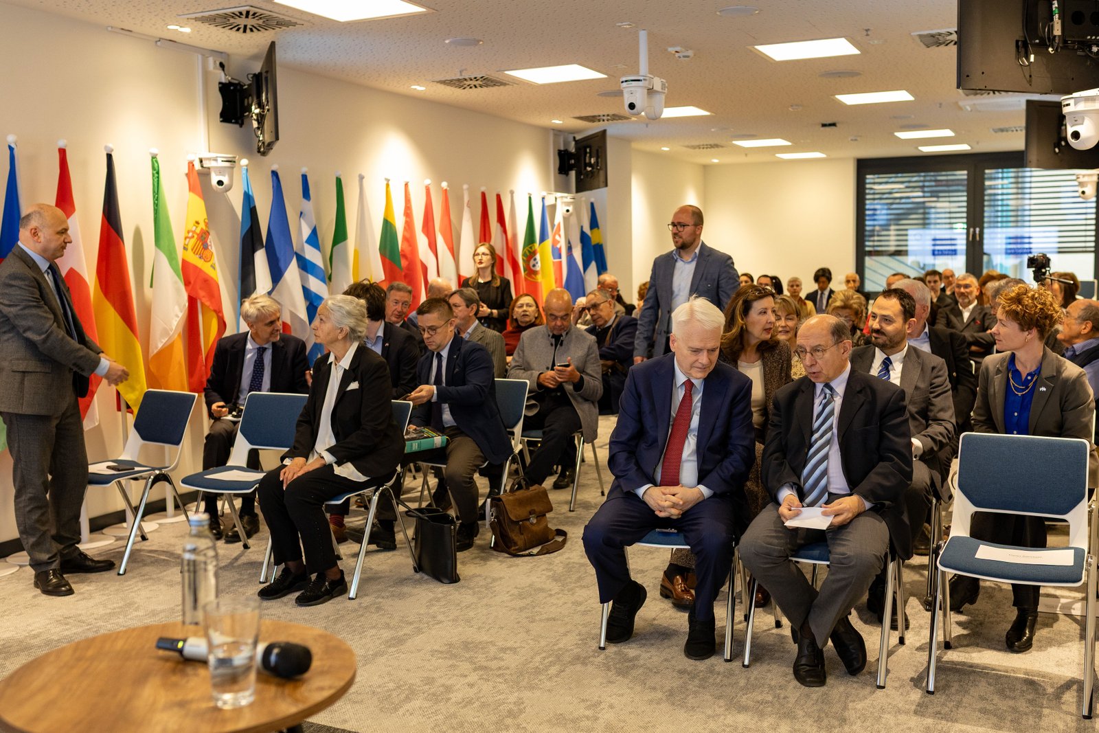 Packed auditorium at a plenary session of an international security conference